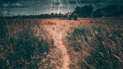 Person walking outdoors in winter cold weather, a common trigger for bladder problems