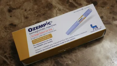 Semaglutide injection pen on a table, referencing the 2025 research on Ozempic and overactive bladder